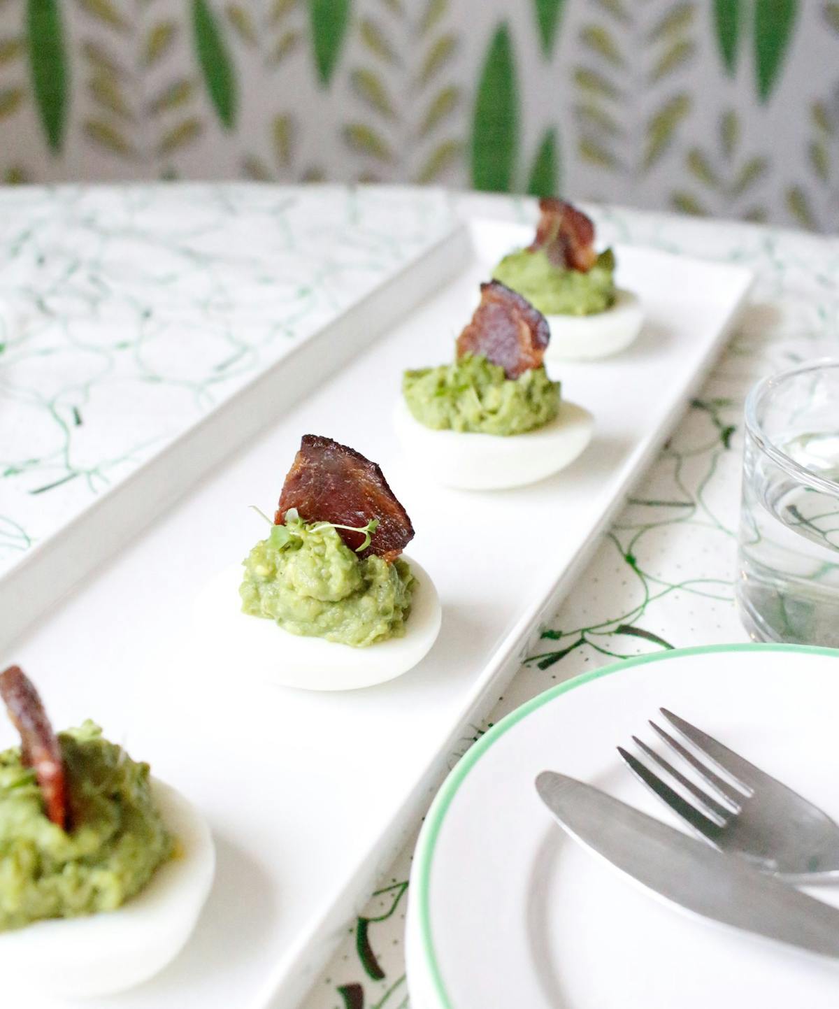 Keto avocado eggs with bacon sails