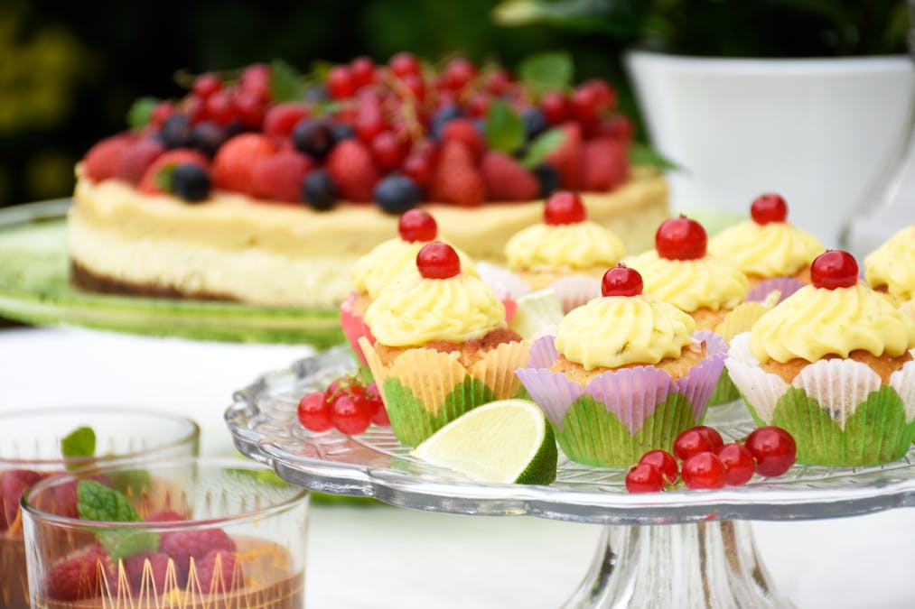 Mini keto coconut cupcakes with lime-curd topping