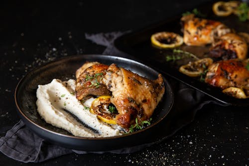 Lemon-baked chicken thighs with cauliflower mash